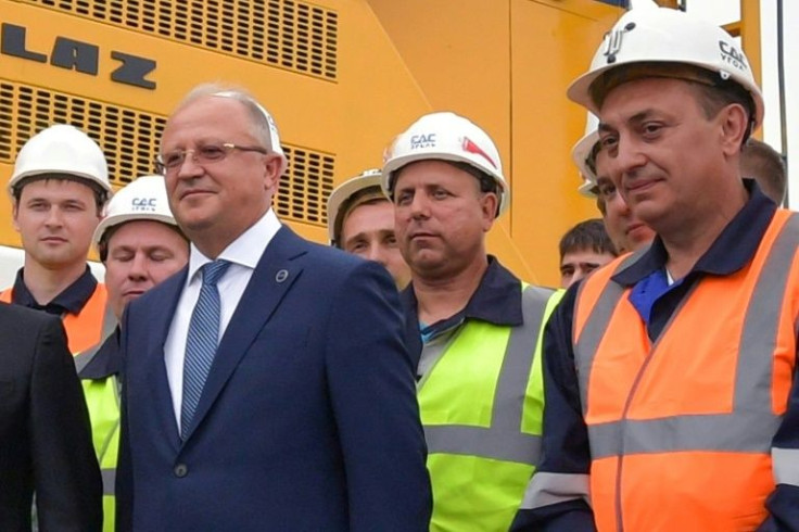 Russia's Investigative Committee, which is responsible for probing serious crimes, said it had charged Mihail Fedyayev (L, pictured August 2018), the owner of the SDS-Ugol company, with breaching "industrial safety requirements"