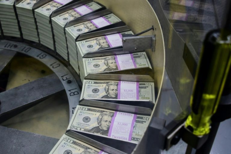 The US dollar held Wednesday's gains after the Federal Reserve took a more hawkish tilt and indicated it would hike interest rates several times as it tries to combat inflation