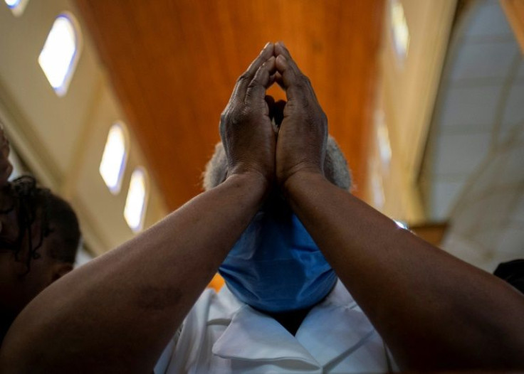 Worshippers at St Peter's Church in Port-au-Prince, Haiti -- the Christian Aid Ministries group said its prayers had been answered with the release of 12 hostages