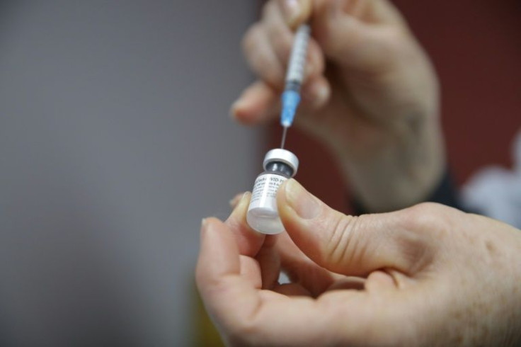 A health worker prepares the Pfizer-BioNtech Covid-19 vaccine in the city of Joinville, Santa Catarina, Brazil