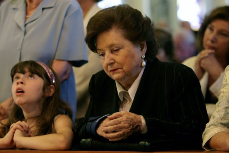 In this file photo taken on December 11, 2007 the widow of the Chilean dictator (1973-1990) Augusto Pinochet, Lucia Hiriart, hears mass at a church in Santiago