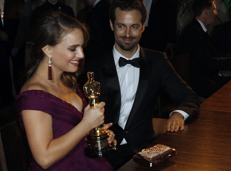 Actress Natalie Portman holds her Oscar, which she won for best actress for her role in quotBlack Swanquot, after the name plate was engraved at the Governor039s Ball after the 83rd Academy Awards in Hollywood, California, February 27, 2011.