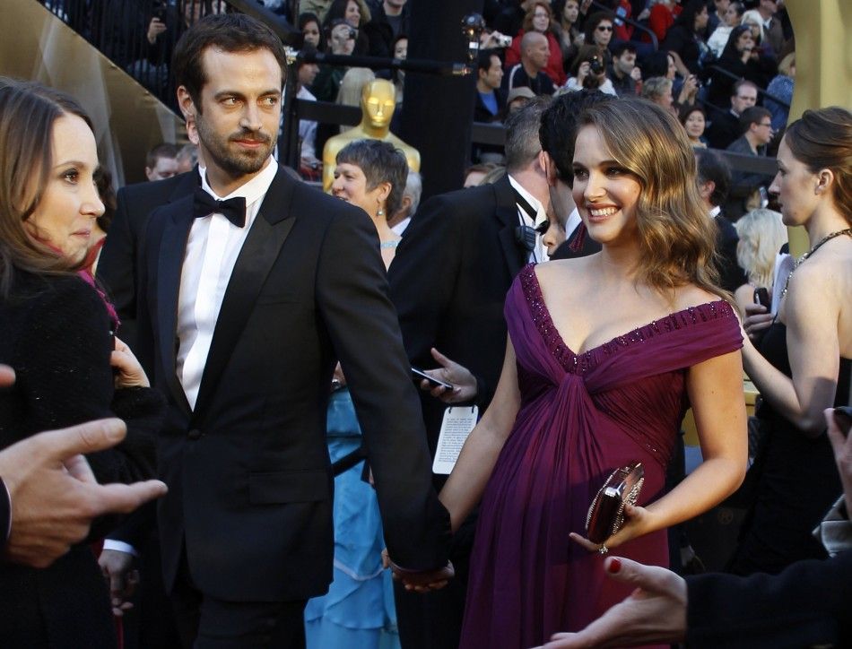 Natalie Portman R, best actress nominee for her role in quotBlack Swanquot, and her fiance, Benjamin Millepied arrive at the 83rd Academy Awards in Hollywood, California February 27, 2011.