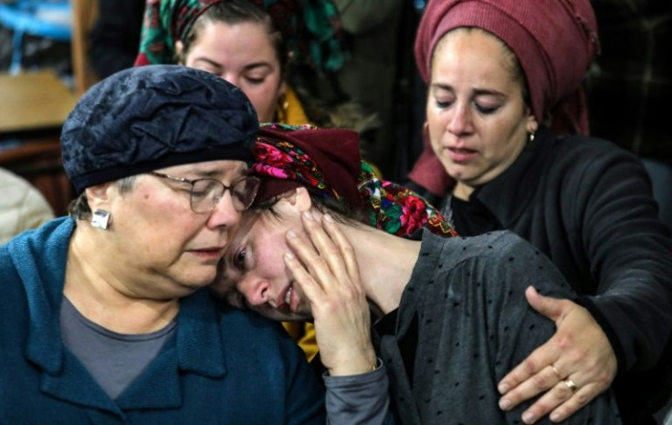Israelis in the settlement of Shavei Shomron, in the occupied West Bank, mourn during the funeral of Yehuda Dimentman, 25, who was killed in a shooting that the army blamed on Palestinians