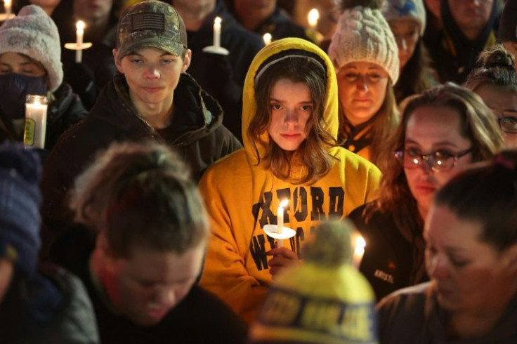 A vigil in Oxford, Michigan to honor the four students killed in a shooting at Oxford High School on November 30, 2021