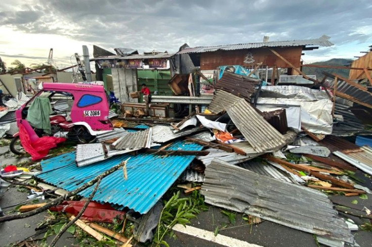 Storm Rai knocked out communications and electricity in many areas, ripping off roofs, toppling concrete power poles and flooding villages