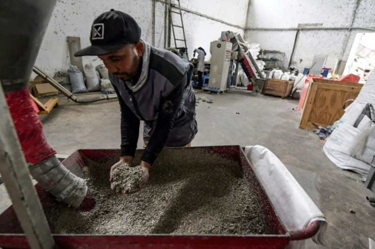 The fine chips of recycled plastic are used by industry