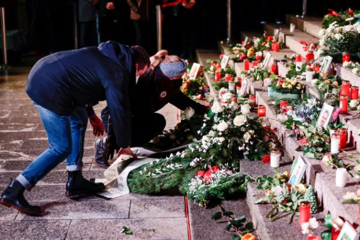 People left flowers at Berlin's 'Der Riss' memorial commemorating the victims of the 2016 terrorist attack