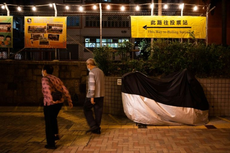 Hong Kong's chief executive Carrie Lam defended the new system and played down the turnout