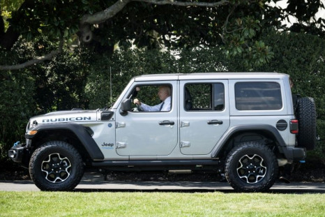 US President Joe Biden, seen here driving an electric Jeep Wrangler Rubicon 4xe, has made fighting climate change a priority, and announced new standards that would raise average fuel efficiency for cars and trucks to cut emissions