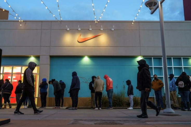 Strong sales in North America helped Nike report higher profits despite a hit from China