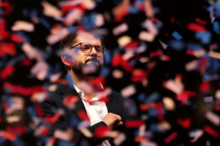 Chilean president-elect Gabriel Boric, pictured after his victory speech on December 19, 2021, has vowed to reduce the work week from 45 to 40 hours, to advance "green development" and to create 500,000 jobs for women