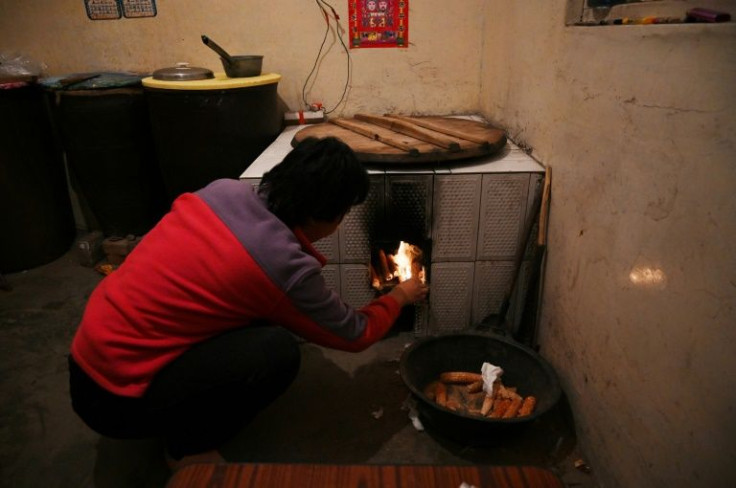 Some families have so little income following the loss of their land to renewables projects that they are burning corn husks to stay warm this winter