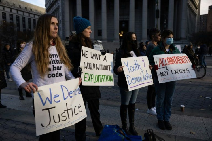 Demonstrators rally in solidarity with the alleged victims of Jeffery Epstein and Ghislaine Maxwell in New York on December 4, 2021