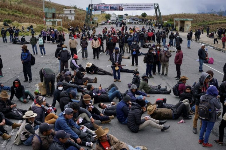 Indigenous people block a road in Santa Catarina Ixtahuacan, Guatemala on December 21, 2021
