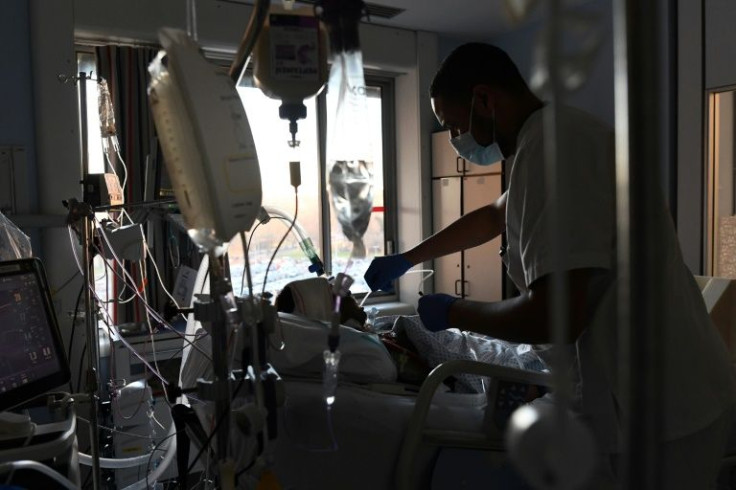 Scientists warn Omicron could cause more excess mortality if soaring infection numbers overwhelm health systems
