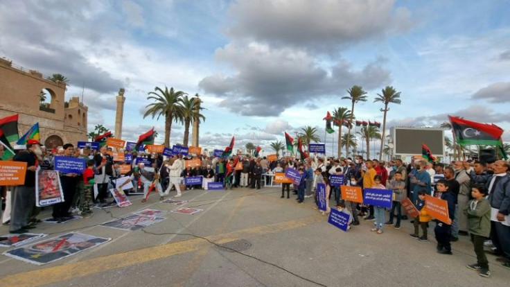 People gather in Tripoli on November 19 to protest against the candidacy of Seif al-Islam Kadhafi, son of slain Libyan dictator Moamer Kadhafi, in presidential polls