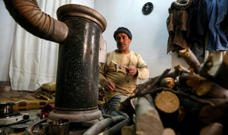 Philippe Azar -- who hasn't put up any Christmas decorations since the start of Syria's war in 2011 -- said he will spend the holiday near his heater