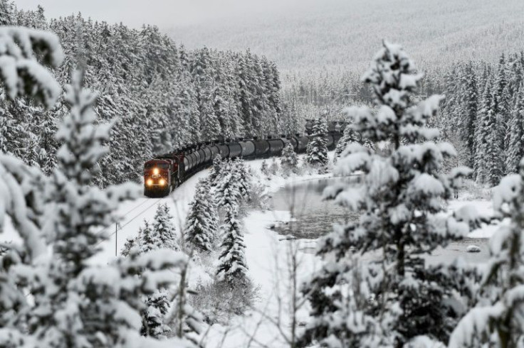 Trains to and from the Pacifc coast port of Vancouver have started rolling again after heavy rains and mudslides damaged tracks in November. To clear a shipping backlog some locomotives have been spotted pulling three kilometers of cars behind them