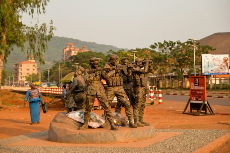 A monument near the University of Bangui pays tribute to Russian private security operators and fighters who 'died for the liberation' of the CAR. It depicts four armed men protecting a mother and her children