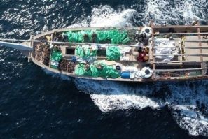 A US handout photo shows a fishing vessel from which the US Navy said it seized 1,400 AK-47 rifles and ammunition being smuggled from Iran to Yemen's Huthi rebels