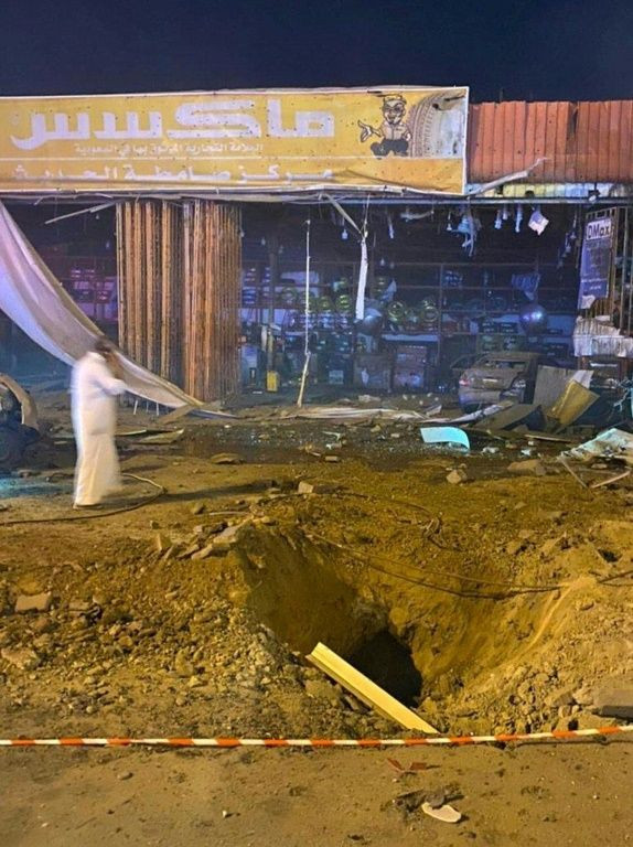 A handout picture provided by the Saudi Press Agency on December 25, 2021 shows the site where a projectile, fired from Yemen, landed and killed two people in Jazan