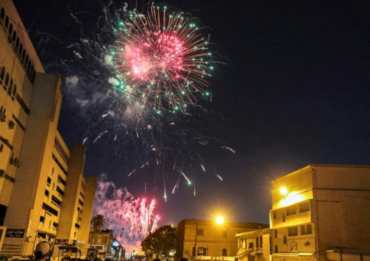 Fireworks lit the sky during the reopening of the renovated street