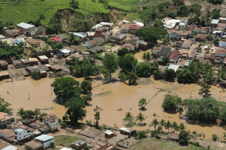 This handout picture taken on December 12, 2021 and released by the Brazilian presidency showings a flooded area in Itamaraju, in the south of Bahia State, Brazil, after heavy rains