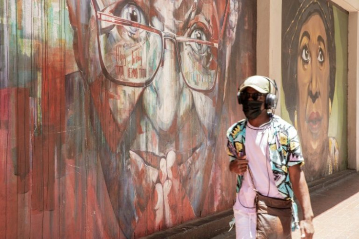 Dozens of South Africans stopped at the cathedral, even though many people would not yet have heard of his death