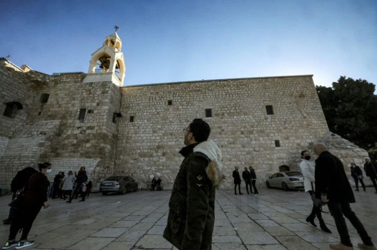 Pictured in Manger Square before the Church of the Nativity, Ayyad is one of 500 Christians from Gaza permitted by Israeli authorities to visit the occupied West Bank for the 2021 Christmas holidays
