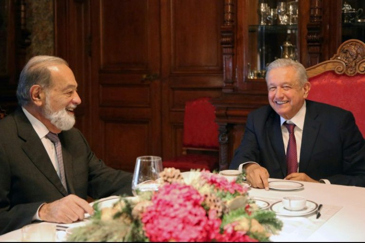 Mexican President Andres Manuel Lopez Obrador (R) and businessman Carlos Slim hold a breakfast meeting at the National Palace in Mexico City on December 27, 2021