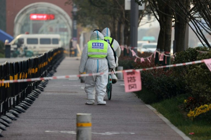 Chinese authorities have faced a resurgent virus in recent weeks, reporting 209 infections on Tuesday -- the highest single-day tally since March last year, when the pandemic raged across the country
