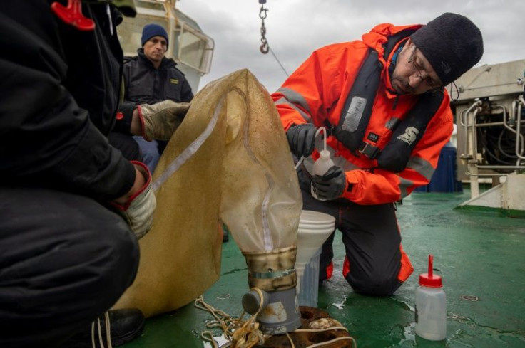 Scientist Maximo Frangopulos (R), researcher at the University of Magallanes (UMAG), collected phytoplankton samples during the nine-day expedition in southern Chile