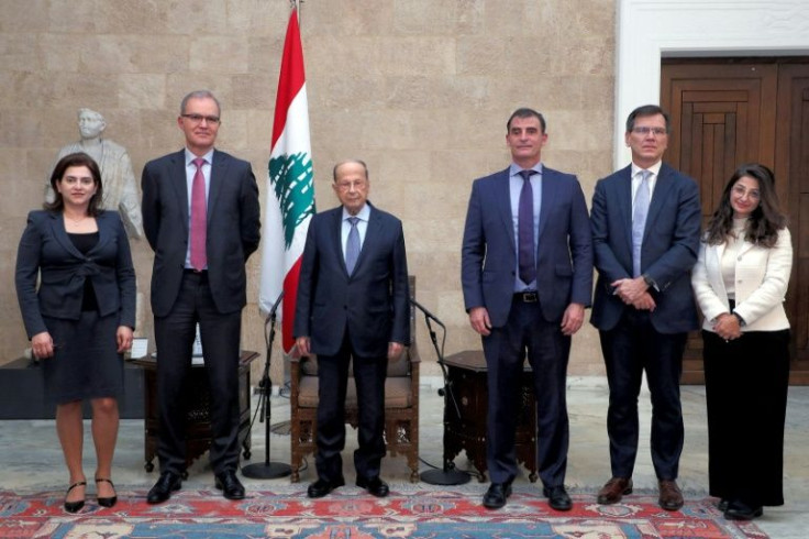 President Michel Aoun (C-L) says an audit of the central bank is due to be submitted to the government next month