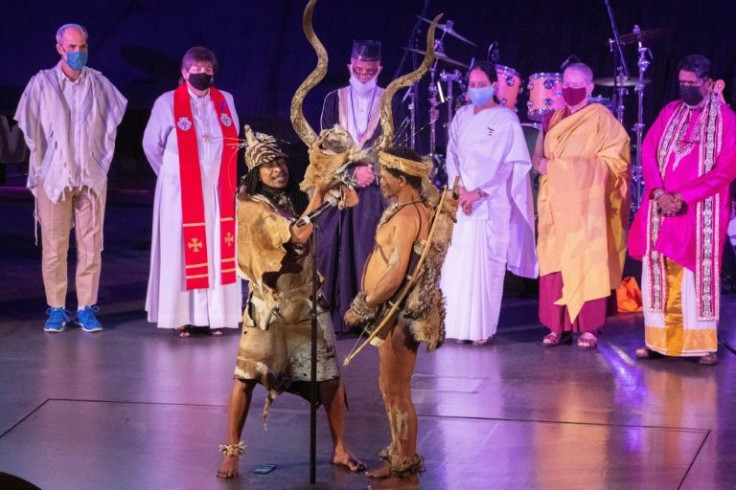 Indigenous Khoisan people take part in an interfaith memorial service in Cape Town to anti-apartheid icon Desmond Tutu, who died on Sunday