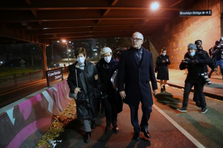 Ghislaine Maxwell's sisters Isabelle (C) and Christina (L), and her brother Kevin (R), leave the courthouse in lower Manhattan after their sister was found guilty of recruiting and grooming young girls to be sexually abused by the late financier Jeffrey E