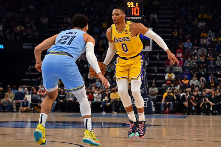 Los Angeles Lakers guard Russell Westbrook #0 handles the ball against Memphis Grizzlies guard Tyus Jones #21