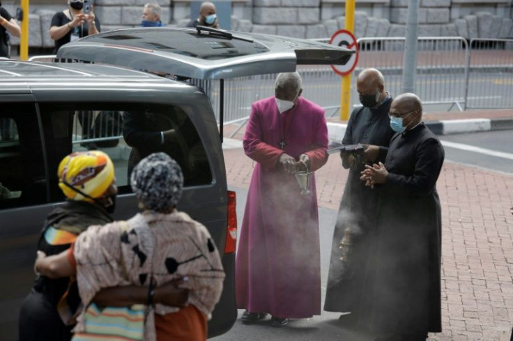 Tutu's successor, Thabo Makgoba, said a prayer after priests burnt incense over the coffin before it was lifted from the hearse.