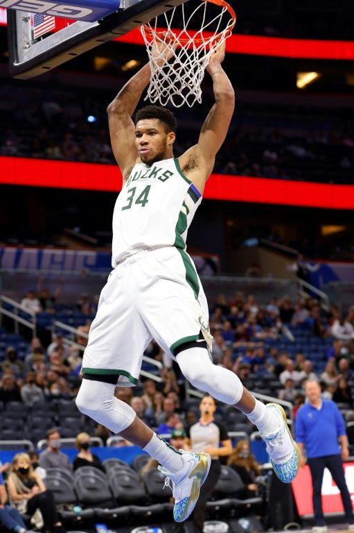 Milwaukee's Giannis Antetokounmpo celebrates a dunk in the Bucks' NBA win over the Orlando Magic