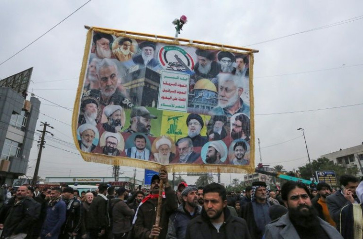 A placard slamming the US and Israel and glorifying Soleimani on display at Saturday's rally