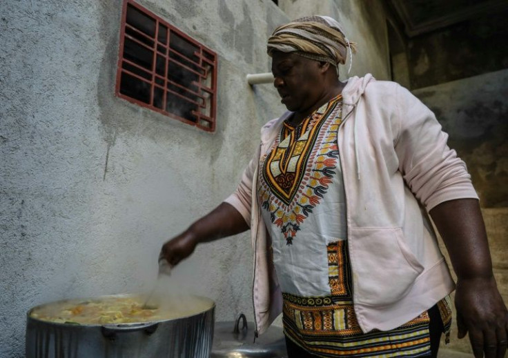 Rosemene Dorceus cooks joumou soup in Port-au-Prince, a traditional meal on Haiti's national holiday