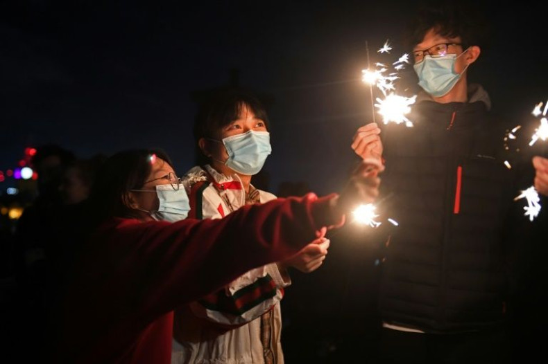 The virus surges dampened New Year's celebrations around the world