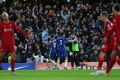 Chelsea's Christian Pulisic (2L) celebrates scoring against Liverpool