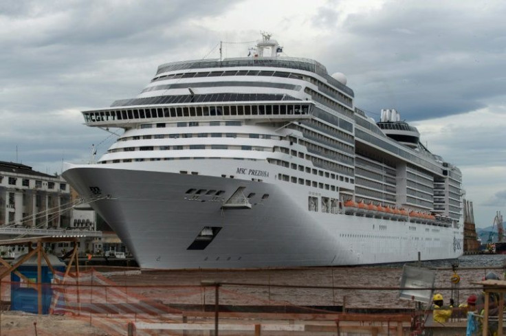 The luxury cruise ship MSC Preziosa, seen at anchor in  Rio de Janeiro on November 26, 2014, is one of three big cruise ships to see Covid outbreaks in late 2021 or the early days of 2022
