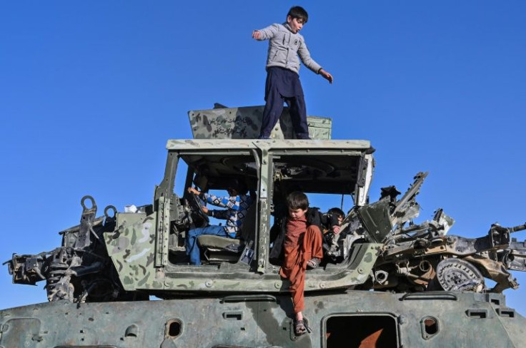 Hulks of destroyed American armoured vehicles are also on informal display on roads outside the city