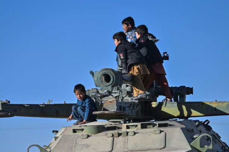 The windfall of weapons, vehicles and uniforms has given the new rulers of Kabul tangible spoils of victory