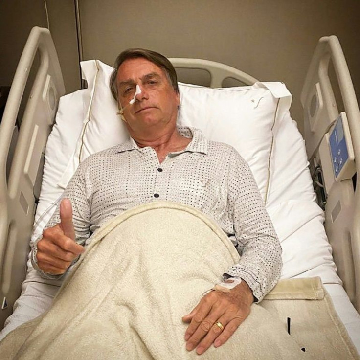 Doctors said Brazilian President Jair Bolsonaro, seen here in a photo posted on his Twitter account, will not need surgery after he was rushed to hospital with a partially blocked intestine