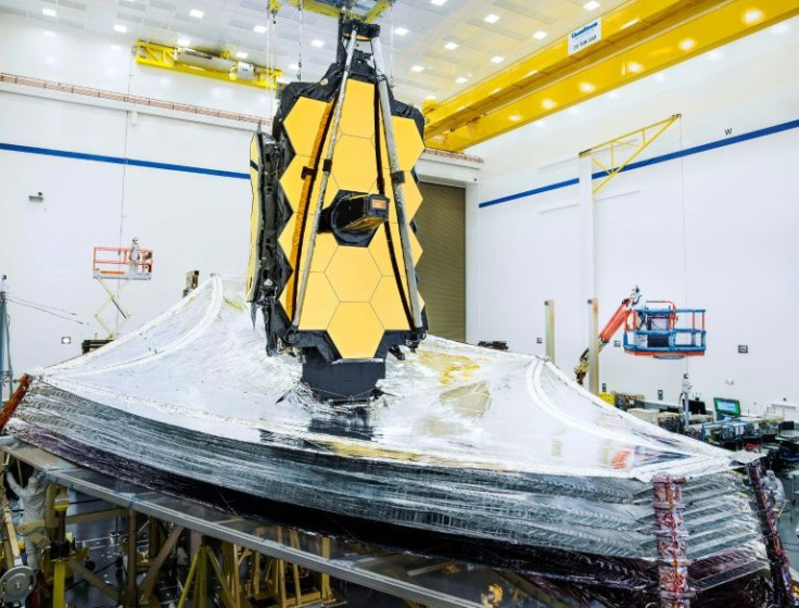 The tennis court size, kite-shaped apparatus acts like a parasol, ensuring the observatory is kept in the shade so that it is able to detect faint infrared signals from the far reaches of the Universe