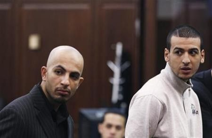 Algerian-born Ahmed Ferhani (L), and Moroccan-born Mohammed Mamdouh stand before a judge during their arraignment in Manhattan criminal court in New York May 12, 2011.