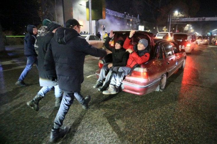 Protesters take part in a rally in Almaty over energy price hikes.